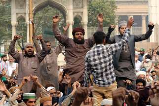  Men protest in Lahore, Pakistan, Oct. 31, after the Supreme Court acquitted Asia Bibi, a Catholic accused of blasphemy.