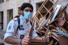 A member of the Maronite Scouts is pictured in an undated photo helping cleanup following an Aug. 4, 2020, blast in Beirut&#039;s port area.