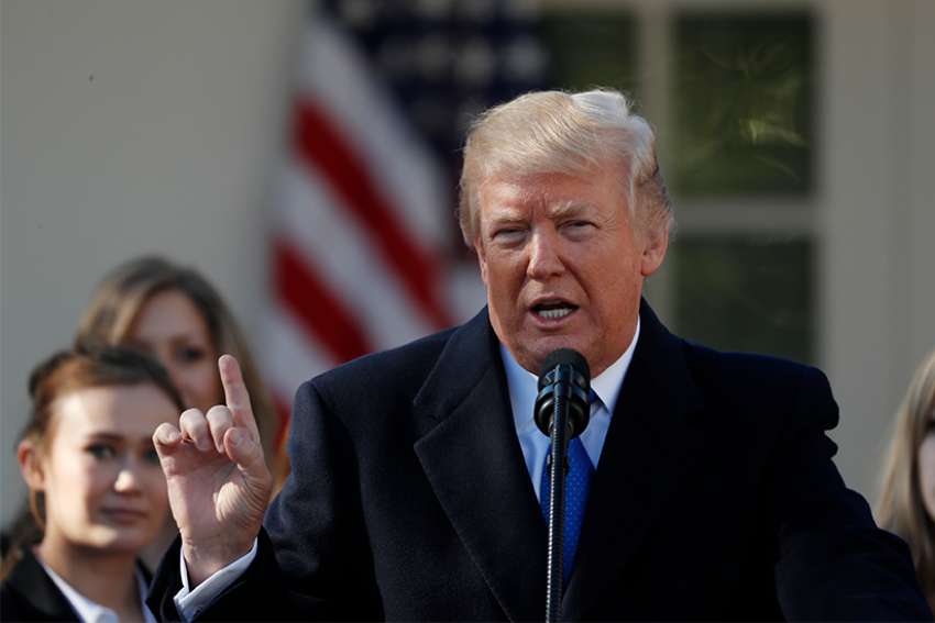 President Donald Trump address attendees of the annual March for Life rally from the Rose Garden of the White House in Washington Jan. 19. The live feed was projected onto a large screen during the rally on the National Mall. 